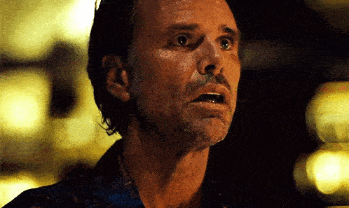 a man looking up at something