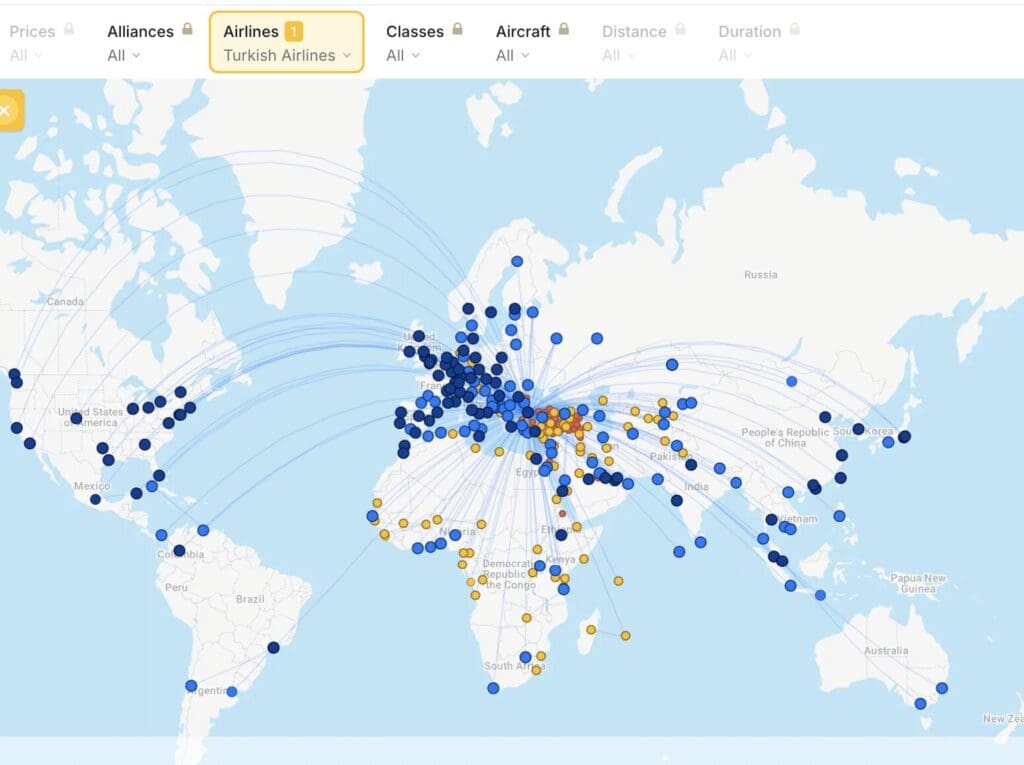 a map of the world with blue and yellow dots