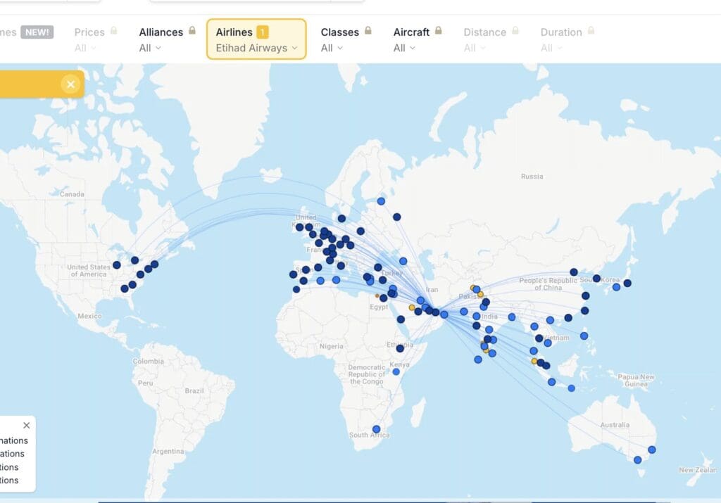 a map of the world with blue dots