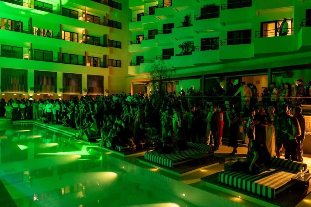 a group of people in a pool at the Ace Hotel Athens