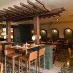 a restaurant with tables and chairs at Bar Luca from Found Hotels