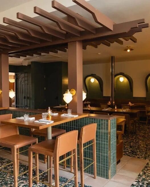a restaurant with tables and chairs at Bar Luca from Found Hotels