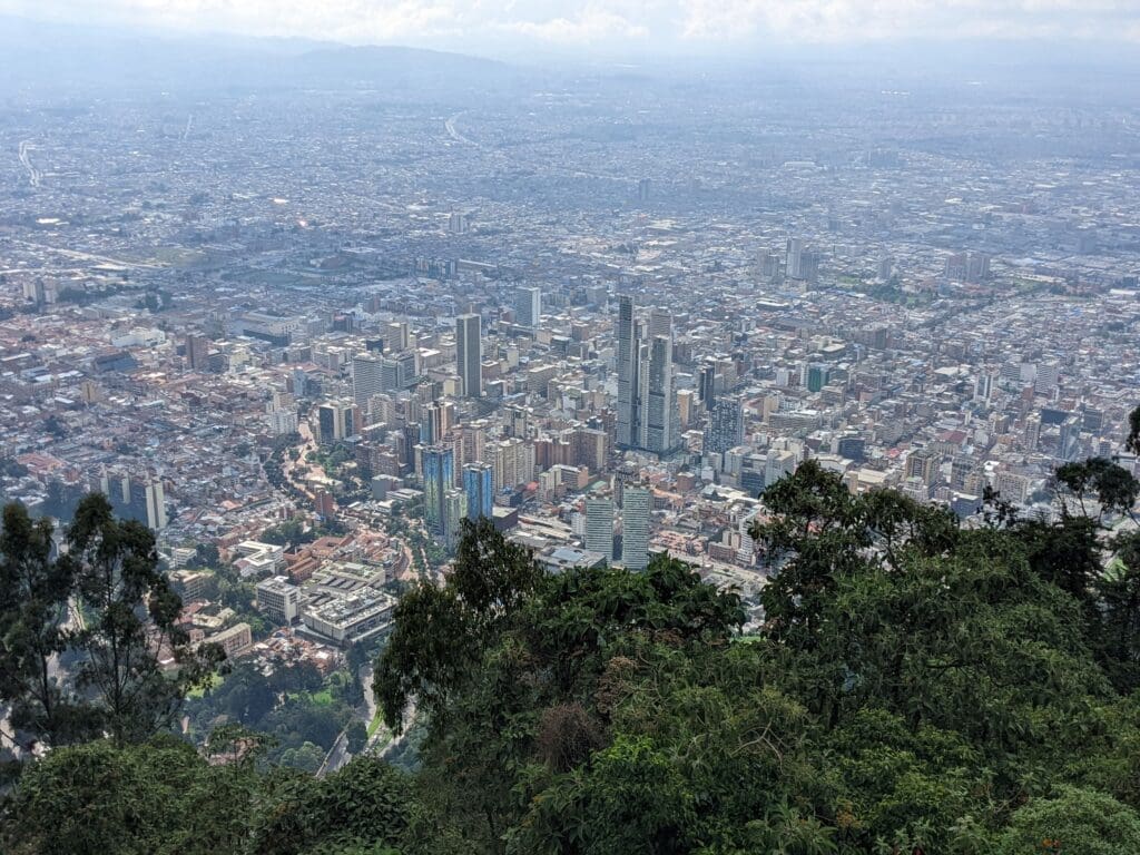 trees and mountains in the background in Bogotá, Colombia.
