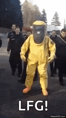 a person in a yellow hazmat suit