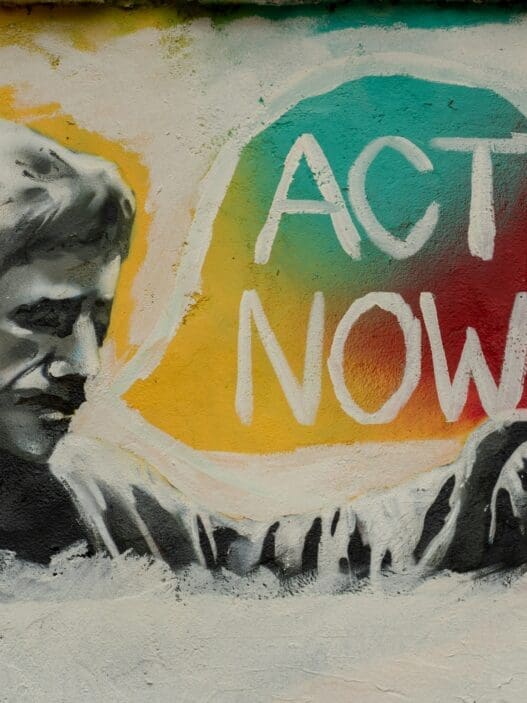 a graffiti of a man pointing at something