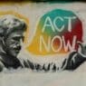 a graffiti of a man pointing at something