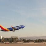 a Southwest plane flying in the sky