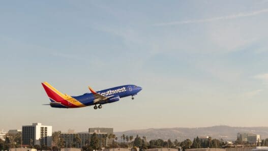 a Southwest plane flying in the sky