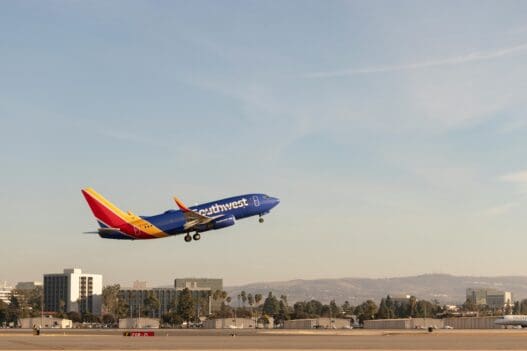 a Southwest plane flying in the sky