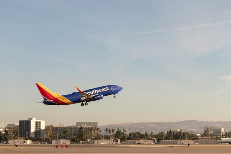 a Southwest plane flying in the sky