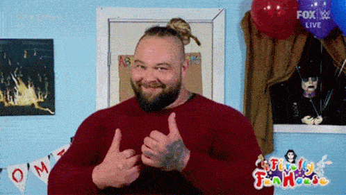 a man with a beard and a bun