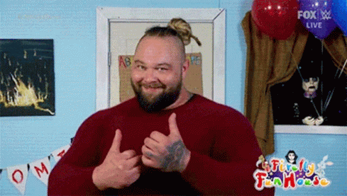 a man with a bun and beard