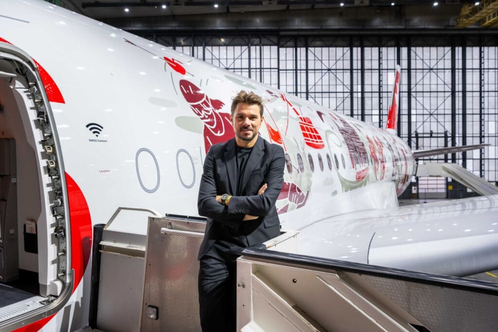 a man leaning on a plane