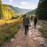 a group of people walking on a trail