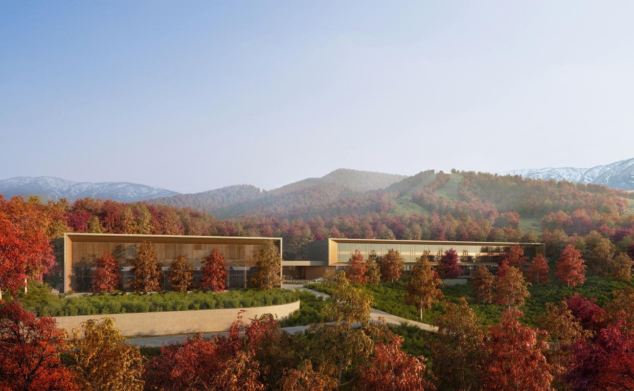 a building with trees in the background