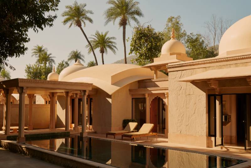 a building with a pool and a roof