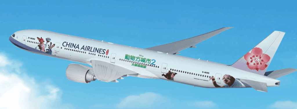 a white airplane with cartoon characters on the side