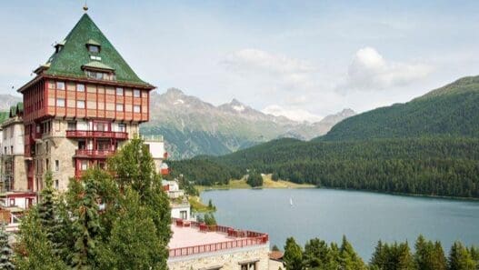 a building next to a lake
