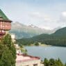 a building next to a lake