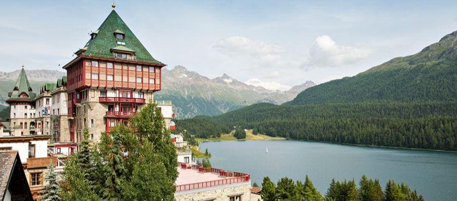 a building next to a lake