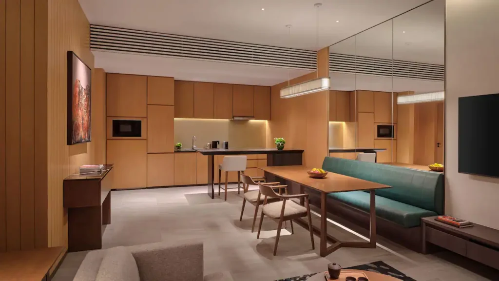 a room with a table and chairs