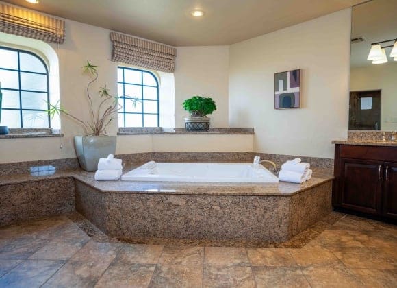 a large bathroom with a large tub