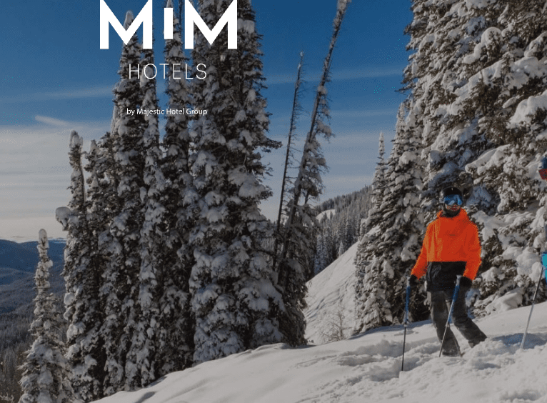 a person skiing down a snowy mountain