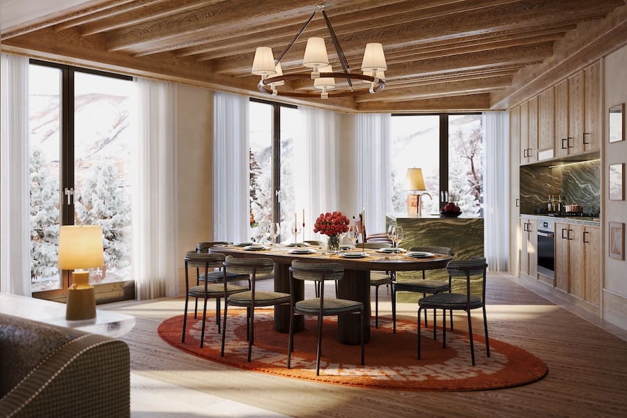 a dining room with a table and chairs