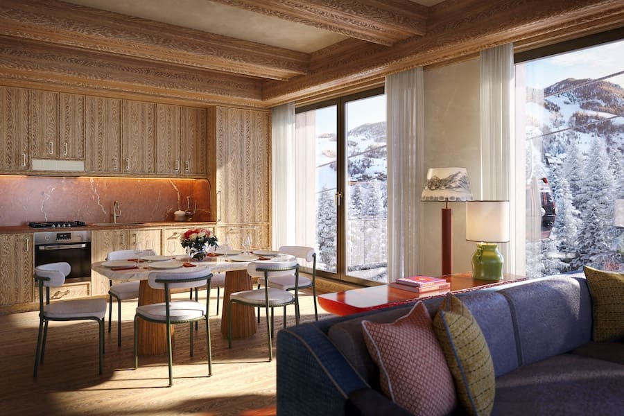 a living room with a table and chairs