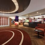 a sports store with a red rug and a red chair