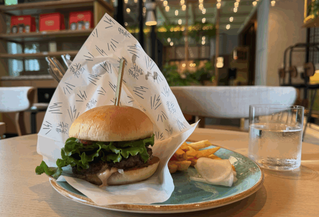 a burger and fries on a plate