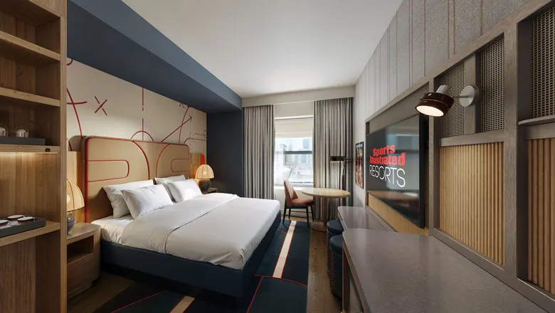 a room with a bed and a tv