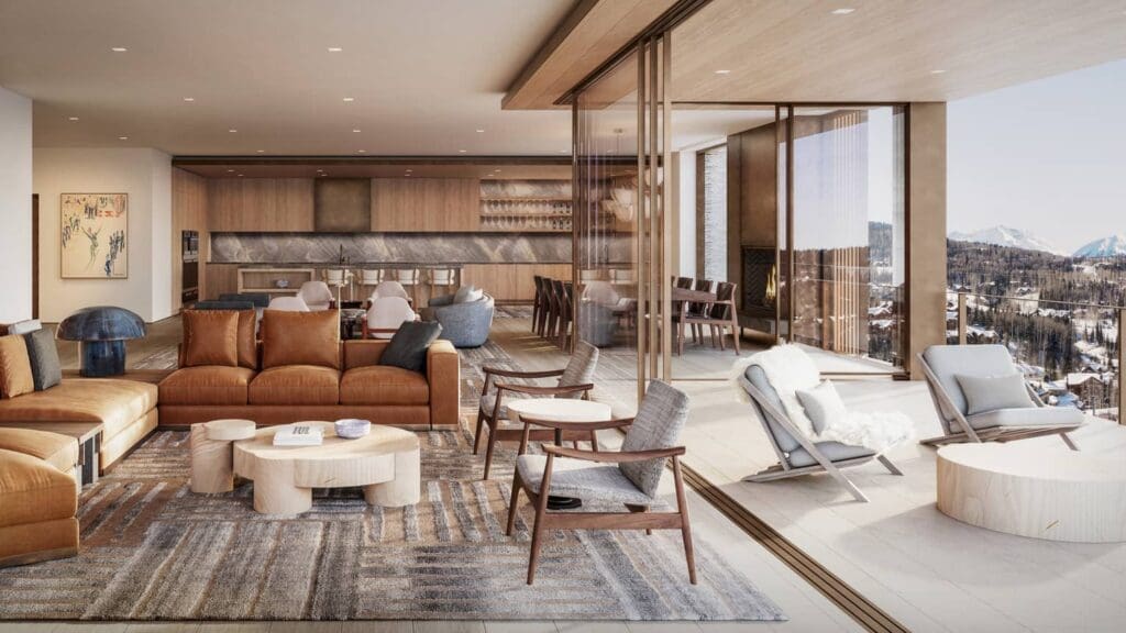 a living room with a couch and chairs