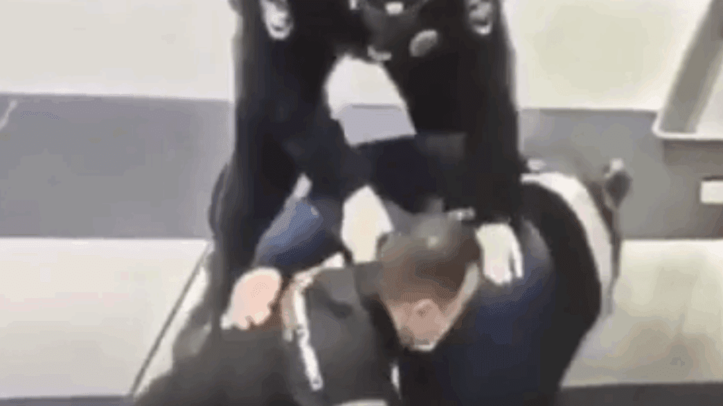 man subued in airport