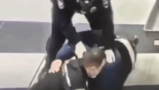 man subued in airport