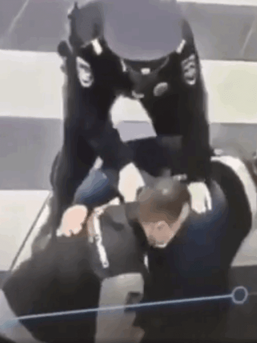 man subued in airport