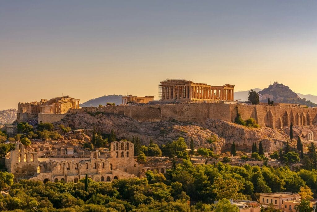 a ruins of an ancient building on a hill