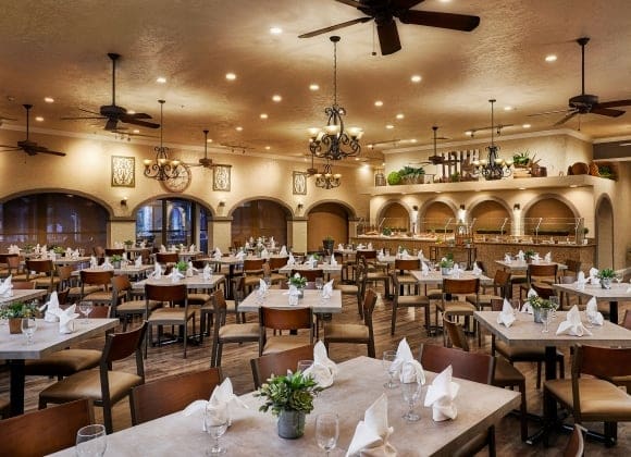 a room with tables and chairs