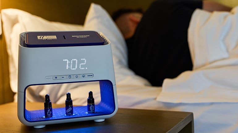 a device with a clock and bottles on it