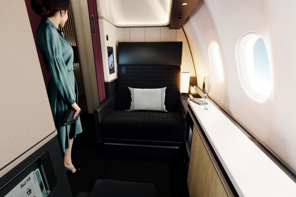a woman in a chair in a plane