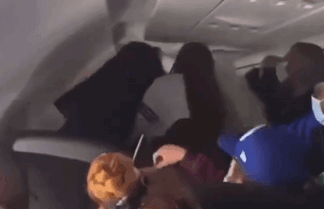 a person sitting on a plane