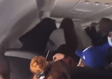 a person sitting on a plane