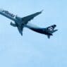 a plane flying in the sky