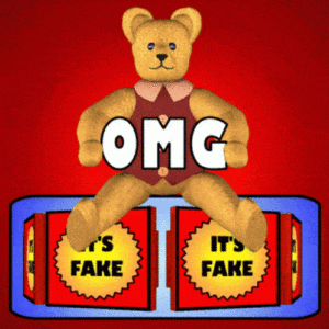 a teddy bear sitting on a red box