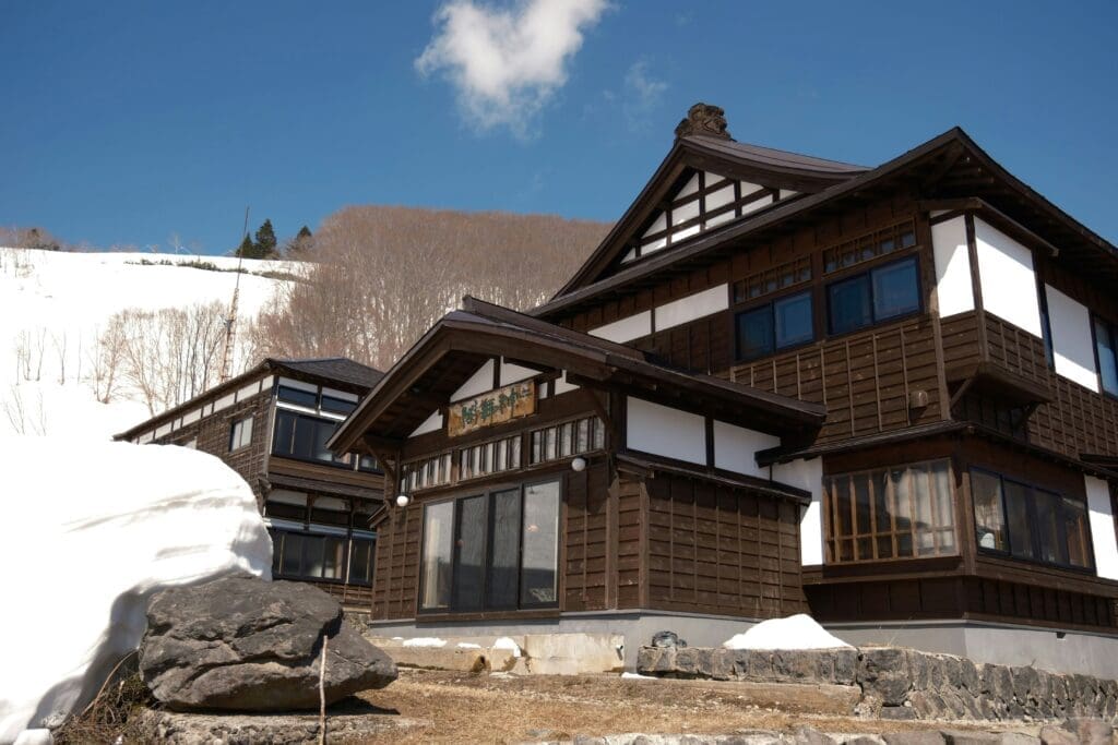 a building with snow on the ground