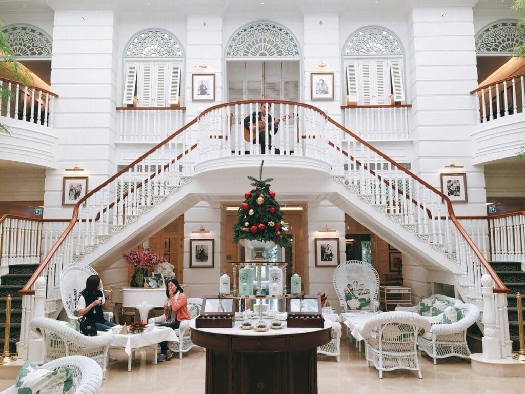 a room with white walls and a staircase