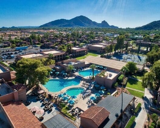 a swimming pool in a resort