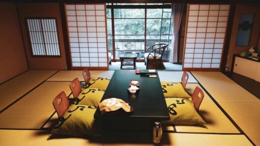 a room with a table and chairs