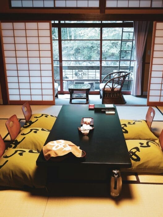 a room with a table and chairs