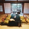 a room with a table and chairs